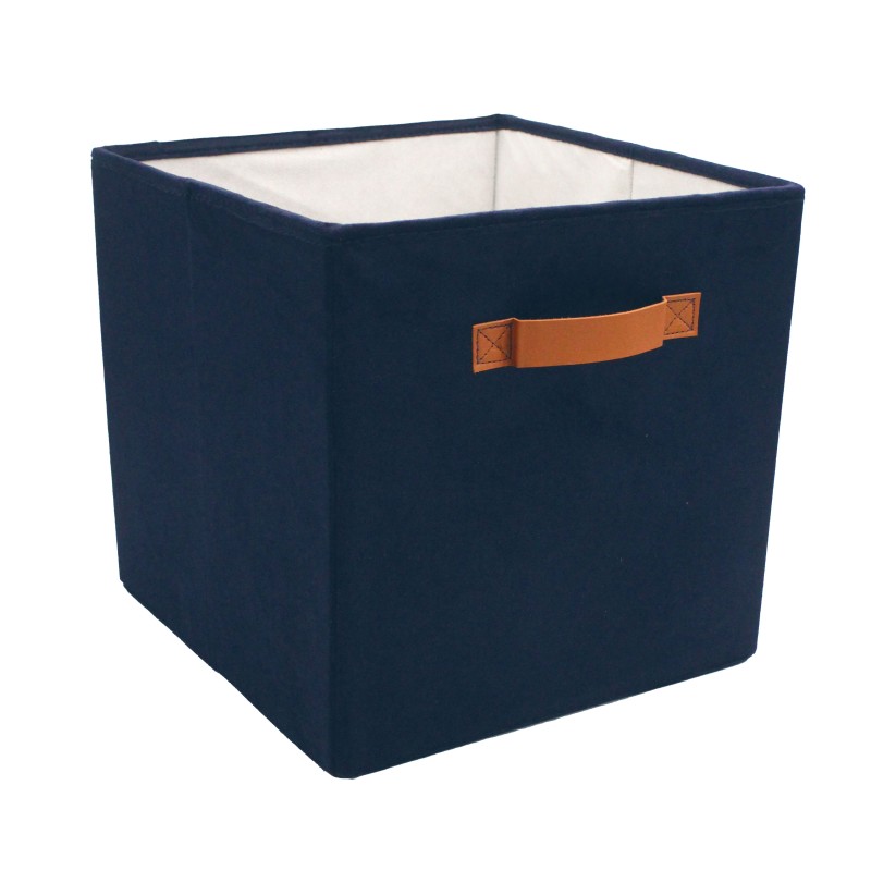 Detail of Cube de rangement bleu marine avec poignée marron
